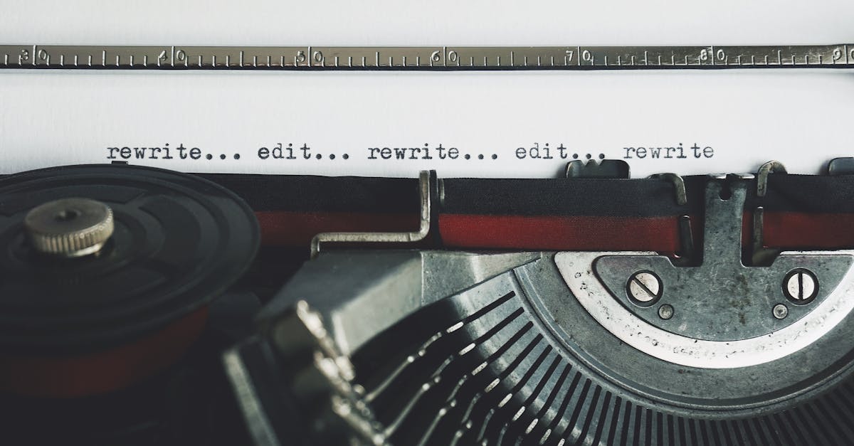 Classic typewriter with text 'rewrite... edit...' on paper.