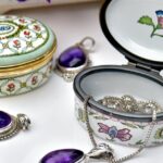 Stunning porcelain jewelry boxes with amethyst pendants and intricate designs, perfect for luxury collections.